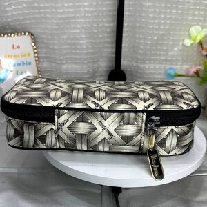 (E4) Vintage Neiman Marcus black straw print travel bag